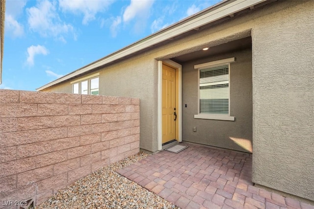 2261 Cold Canyon Ave, North Las Vegas, NV 89086 - entrance to property with stucco siding and a patio area