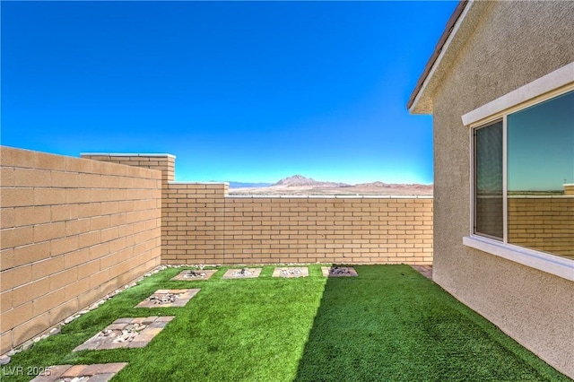 879 Klamath Springs St, Henderson, NV 89011 - fenced backyard featuring a mountain view