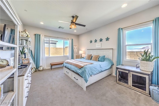 879 Klamath Springs St, Henderson, NV 89011 - bedroom featuring light colored carpet, a ceiling fan, and recessed lighting
