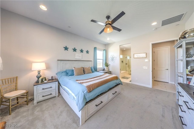 879 Klamath Springs St, Henderson, NV 89011 - bedroom with light carpet, ensuite bath, recessed lighting, and ceiling fan