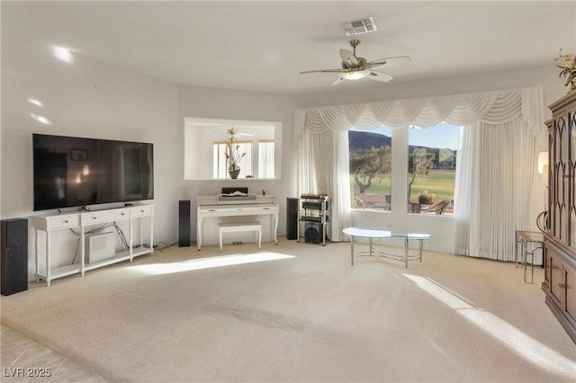585 Mountain Links Dr, Henderson, NV 89012 - living area with a ceiling fan and carpet