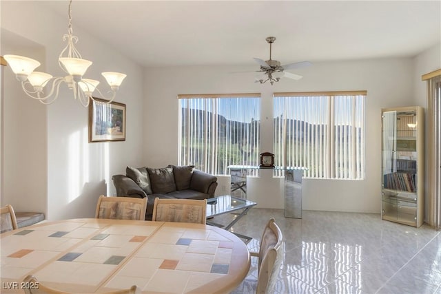 585 Mountain Links Dr, Henderson, NV 89012 - dining room featuring a chandelier and a ceiling fan