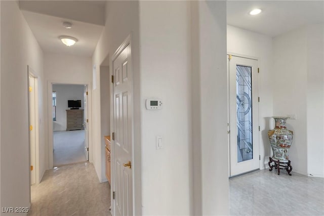 585 Mountain Links Dr, Henderson, NV 89012 - hallway with light tile patterned floors and baseboards
