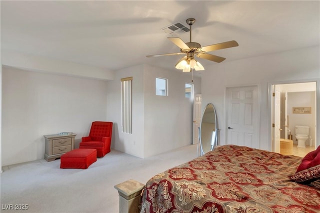 585 Mountain Links Dr, Henderson, NV 89012 - carpeted bedroom with ensuite bath and ceiling fan