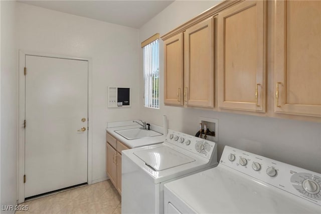 585 Mountain Links Dr, Henderson, NV 89012 - laundry room with independent washer and dryer, cabinet space, and light tile patterned floors