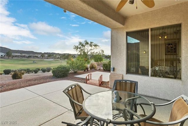 585 Mountain Links Dr, Henderson, NV 89012 - view of patio with ceiling fan, outdoor dining space, and view of golf course