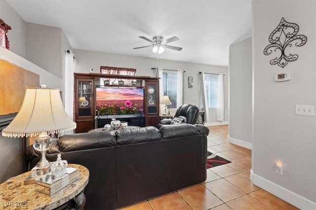 10918 Avenzano St, Las Vegas, NV 89141 - living area featuring light tile patterned flooring and ceiling fan