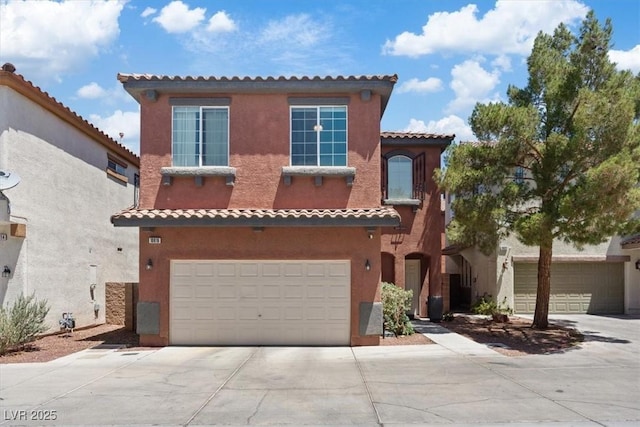 10918 Avenzano St, Las Vegas, NV 89141 - mediterranean / spanish home featuring driveway, an attached garage, a tile roof, and stucco siding