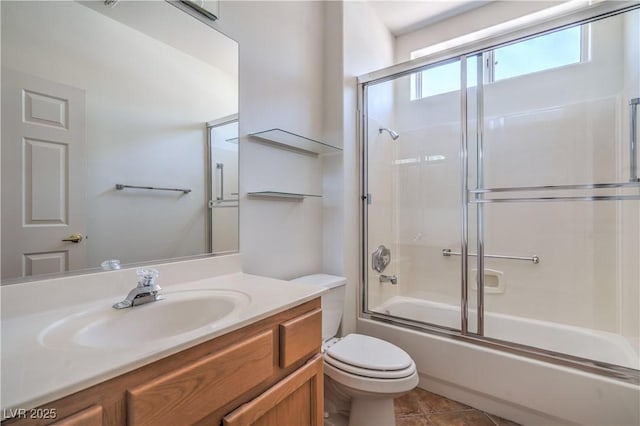 2413 Rockford St, Las Vegas, NV 89134 - full bathroom featuring vanity, bath / shower combo with glass door, and tile patterned flooring