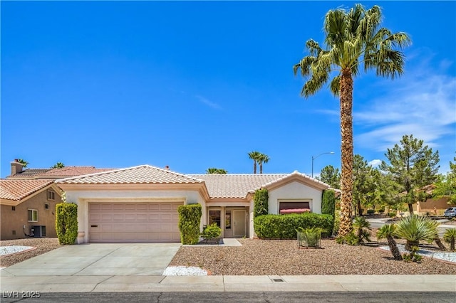 2413 Rockford St, Las Vegas, NV 89134 - single story home featuring an attached garage, a tile roof, driveway, and stucco siding