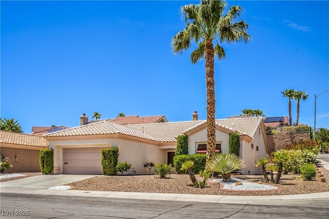 2413 Rockford St, Las Vegas, NV 89134 - view of front of home featuring a chimney, an attached garage, driveway, and a tile roof