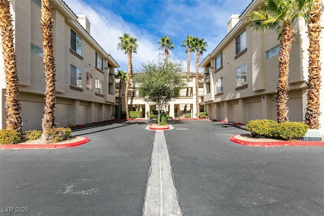 7163 S Durango Dr Unit 302, Las Vegas, NV 89113 - view of asphalt street featuring a residential view and curbs