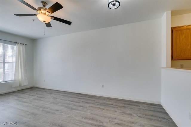 7163 S Durango Dr Unit 302, Las Vegas, NV 89113 - unfurnished room featuring light wood-type flooring and a ceiling fan