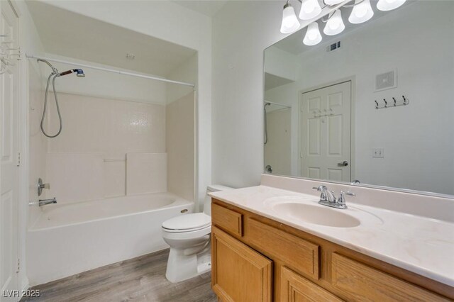 7163 S Durango Dr Unit 302, Las Vegas, NV 89113 - bathroom with vanity, wood finished floors, and bathtub / shower combination
