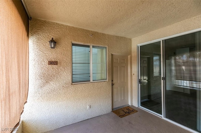7163 S Durango Dr Unit 302, Las Vegas, NV 89113 - property entrance with stucco siding