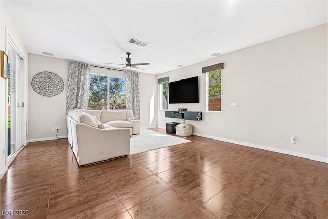7017 Pearl Hilltop Ct, Las Vegas, NV 89148 - living room with ceiling fan and tile patterned flooring