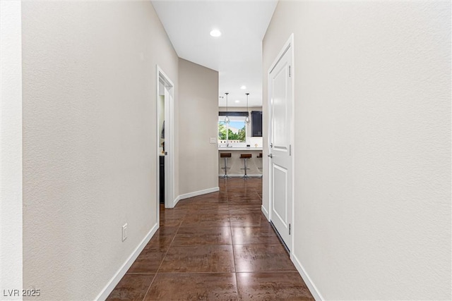 7017 Pearl Hilltop Ct, Las Vegas, NV 89148 - corridor with baseboards and recessed lighting
