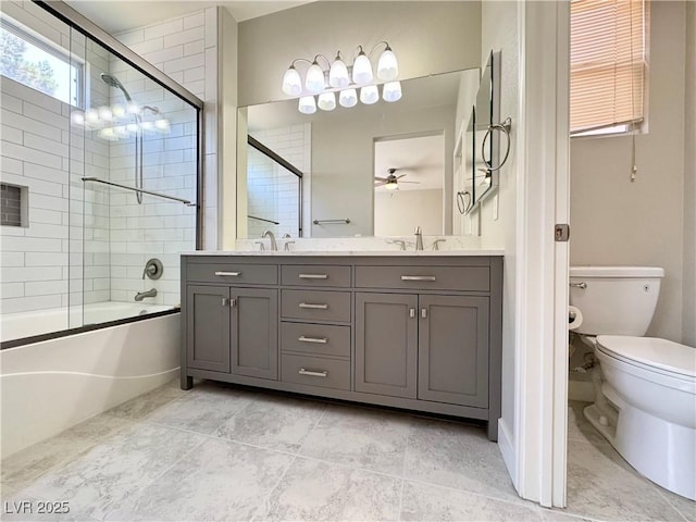 3532 Mountain Park St, Las Vegas, NV 89129 - full bathroom with double vanity, a ceiling fan, enclosed tub / shower combo, and tile patterned floors
