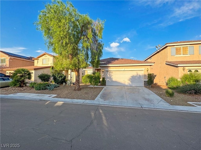 3532 Mountain Park St, Las Vegas, NV 89129 - view of front of home with a garage, concrete driveway, and stucco siding
