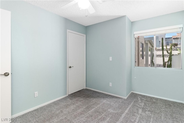 2152 High Dunes Ln, Laughlin, NV 89029 - unfurnished room with a ceiling fan, carpet floors, and a textured ceiling