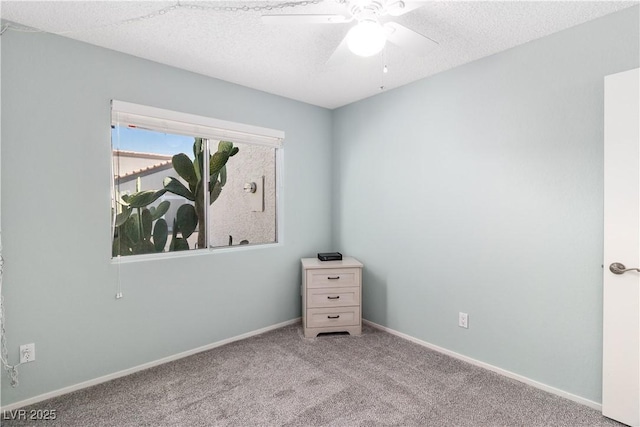 2152 High Dunes Ln, Laughlin, NV 89029 - empty room featuring ceiling fan, carpet, and a textured ceiling