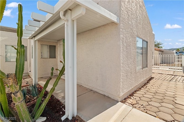 2152 High Dunes Ln, Laughlin, NV 89029 - view of property exterior with stucco siding and a patio