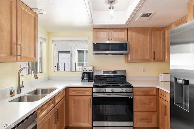 2152 High Dunes Ln, Laughlin, NV 89029 - kitchen featuring stainless steel appliances and light countertops
