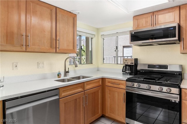 2152 High Dunes Ln, Laughlin, NV 89029 - kitchen with stainless steel appliances, light countertops, and light tile patterned floors