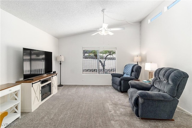 2152 High Dunes Ln, Laughlin, NV 89029 - carpeted living area featuring a ceiling fan, lofted ceiling, and a textured ceiling