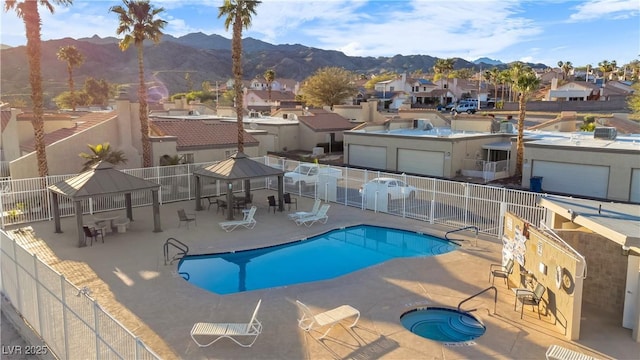 2152 High Dunes Ln, Laughlin, NV 89029 - community pool featuring a gazebo, a residential view, a mountain view, and a patio area