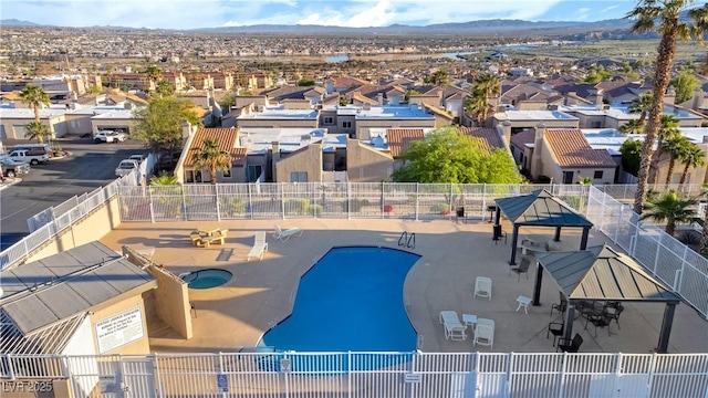 2152 High Dunes Ln, Laughlin, NV 89029 - aerial perspective of suburban area with mountains and a pool
