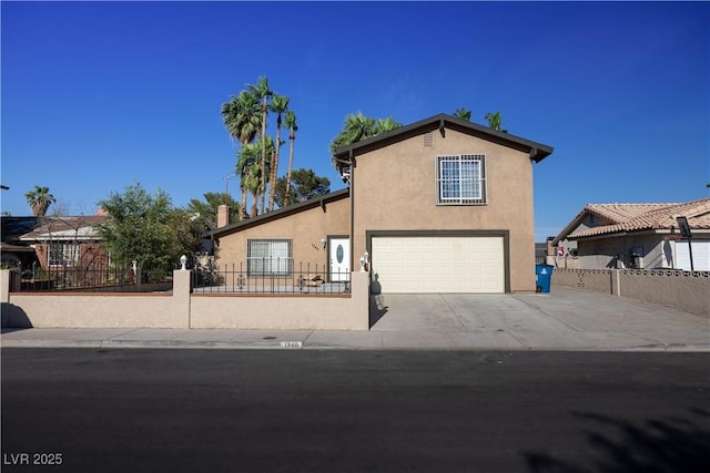 1340 Lucky St, Las Vegas, NV 89104 - view of front facade with an attached garage, stucco siding, and driveway