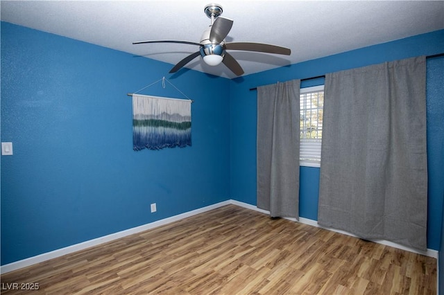 1340 Lucky St, Las Vegas, NV 89104 - unfurnished room featuring wood finished floors and a ceiling fan