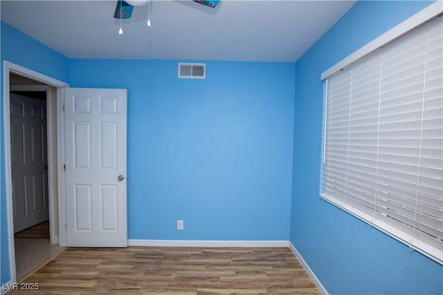 1340 Lucky St, Las Vegas, NV 89104 - unfurnished room with wood finished floors and a ceiling fan