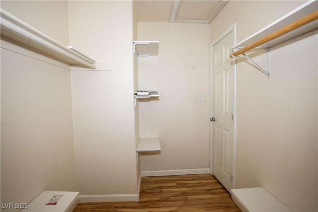 1340 Lucky St, Las Vegas, NV 89104 - walk in closet featuring wood finished floors