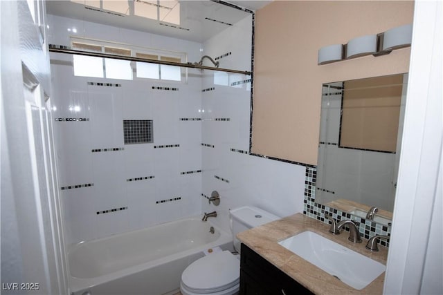 1340 Lucky St, Las Vegas, NV 89104 - bathroom featuring vanity, shower / bath combination, and tasteful backsplash