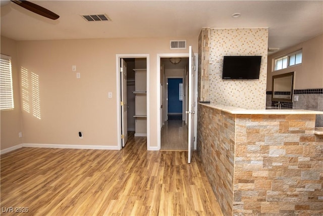 1340 Lucky St, Las Vegas, NV 89104 - unfurnished living room featuring wood finished floors and a ceiling fan