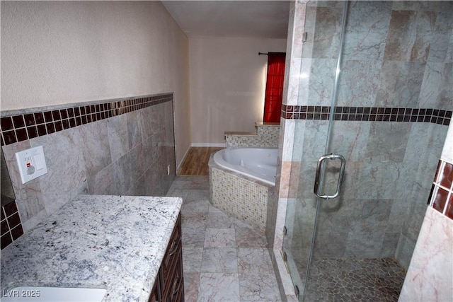 1340 Lucky St, Las Vegas, NV 89104 - bathroom with a bath, a shower stall, and vanity
