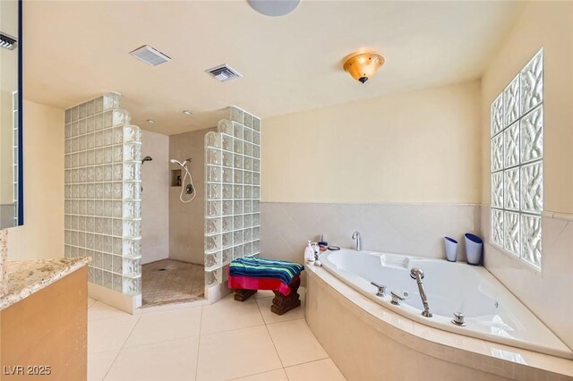 2770 La Casita Ave, Las Vegas, NV 89120 - full bath featuring a garden tub, a walk in shower, and tile patterned flooring