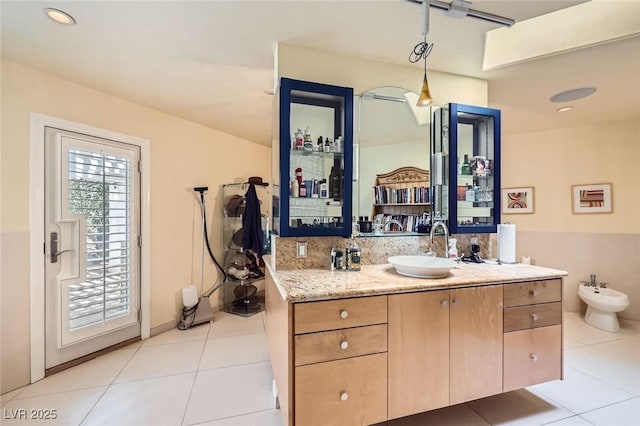 2770 La Casita Ave, Las Vegas, NV 89120 - full bath featuring a bidet, vanity, and tile patterned floors