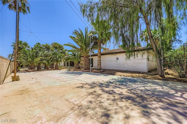 2770 La Casita Ave, Las Vegas, NV 89120 - rear view of house featuring stucco siding and a patio area