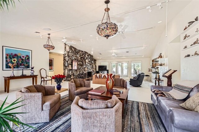 2770 La Casita Ave, Las Vegas, NV 89120 - living room featuring ceiling fan, vaulted ceiling, and rail lighting