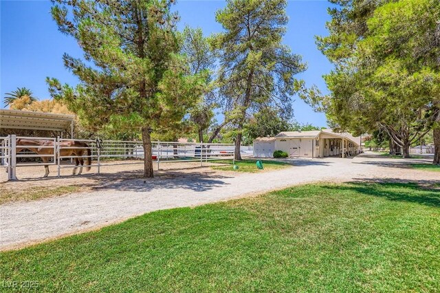 2770 La Casita Ave, Las Vegas, NV 89120 - view of yard with an exterior structure, an outdoor structure, and dirt driveway