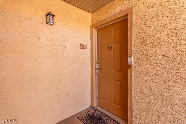 5301 River Glen Dr Unit 205, Las Vegas, NV 89103 - property entrance with stucco siding