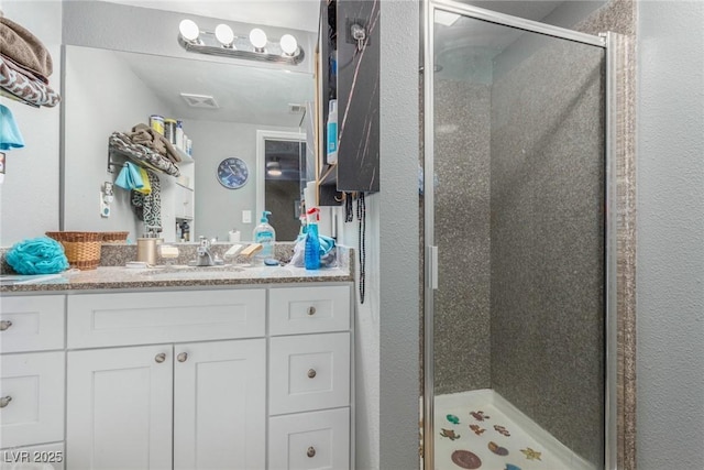 5301 River Glen Dr Unit 205, Las Vegas, NV 89103 - full bath featuring vanity and a shower stall