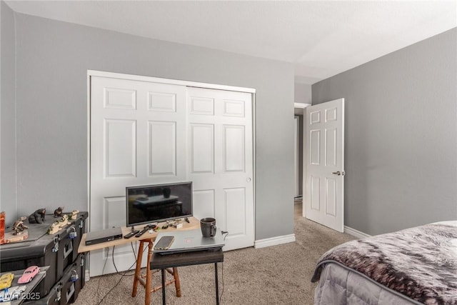 5301 River Glen Dr Unit 205, Las Vegas, NV 89103 - bedroom featuring carpet, an office area, and a closet
