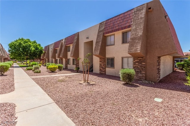 5301 River Glen Dr Unit 205, Las Vegas, NV 89103 - view of building exterior featuring a residential view