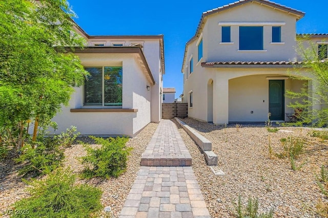 9440 Lunar Ray St, Las Vegas, NV 89143 - view of front of home featuring stucco siding and a tile roof
