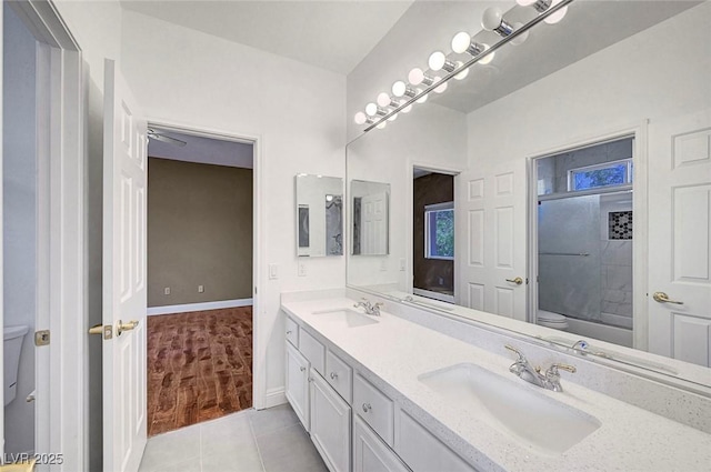 229 N Buteo Woods Ln, Las Vegas, NV 89144 - bathroom with double vanity, tile patterned floors, and shower / bath combination