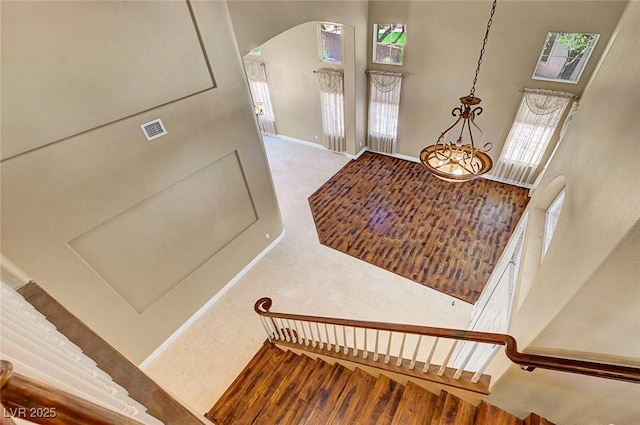 229 N Buteo Woods Ln, Las Vegas, NV 89144 - entrance foyer with arched walkways and a high ceiling